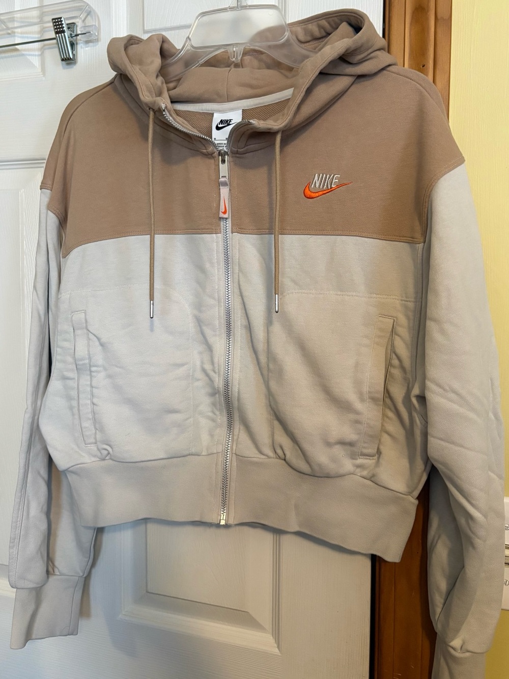 Nike Women’s Two-Tone Hooded Zip Jacket in Beige and Cream with Orange Logo